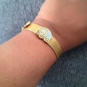 NEW- gold tone elephant bracelet